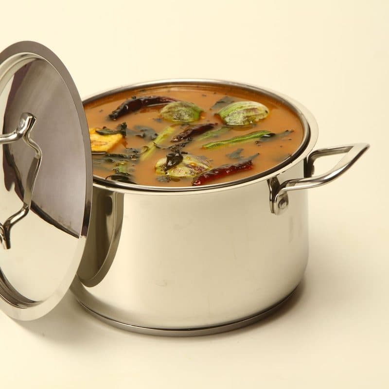 A small stainless steel pot of food on a stove. Illustrative stock photograph, not a photograph of the reviewed pan.
