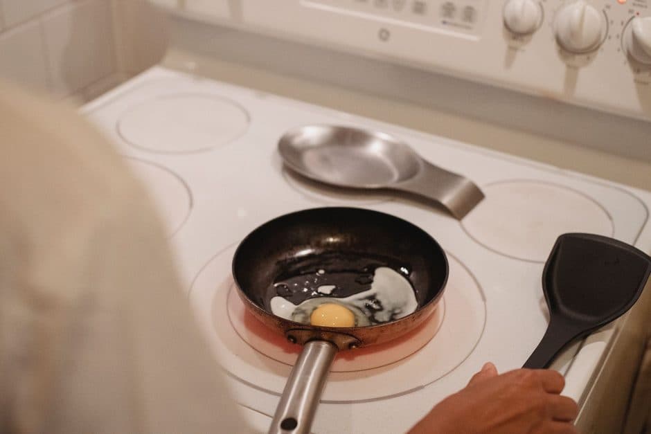 A frying pan sitting on a stovetop.